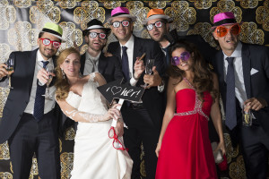 wedding photo booth - group of guests with funny glasses and hats
